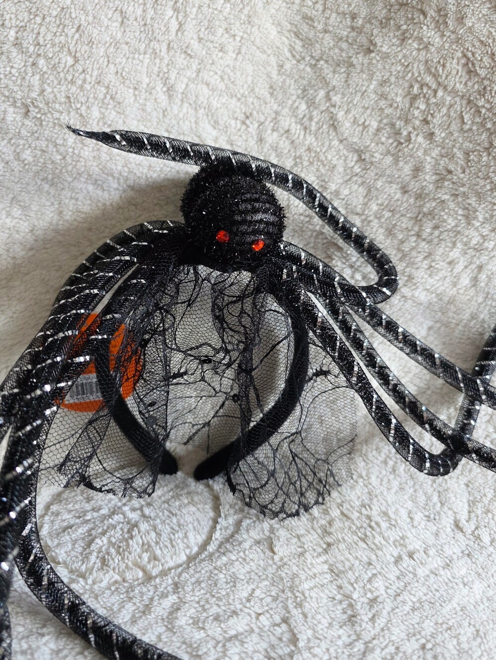 New novelty black & silver Halloween spider headband, red eyes, bendable legs